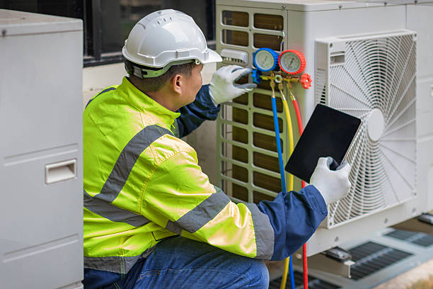 Professional Hvac Maintenance technician working in Abington, MA
